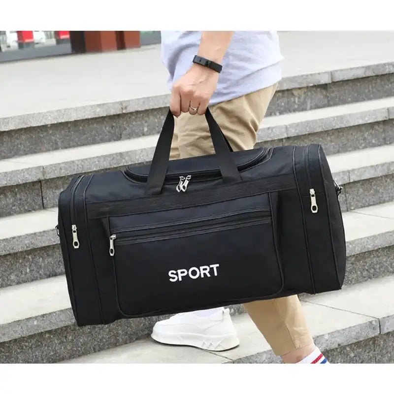 Sac de sport bandoulière noir avec plusieurs compartiments et poignées de transport