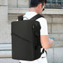 Sac de voyage MoveCase I en forme de valise avec sac à dos rectangulaire noir à plusieurs poches zippées