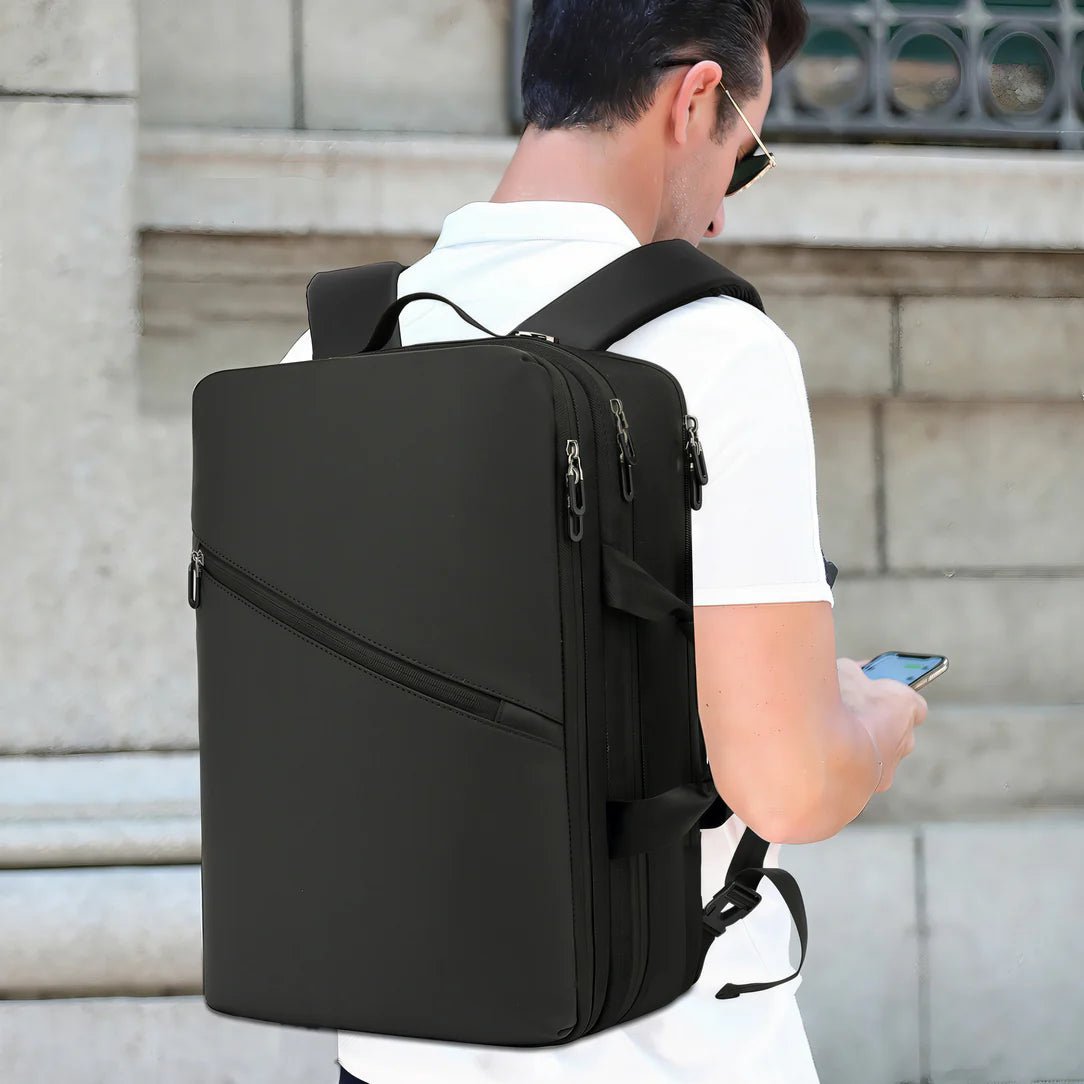 Sac de voyage MoveCase I en forme de valise avec sac à dos rectangulaire noir à plusieurs poches zippées