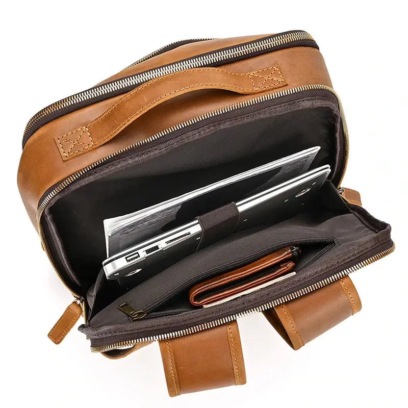 Sac ordinateur pour femme de luxe en cuir ouvert avec laptop, documents et portefeuille